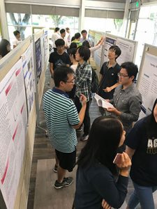 students talking in a hallway